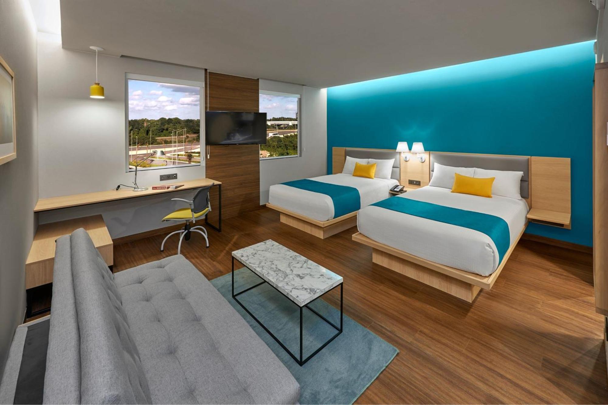 City Express Suites By Marriott Cancun Aeropuerto Alfredo V. Bonfil Esterno foto